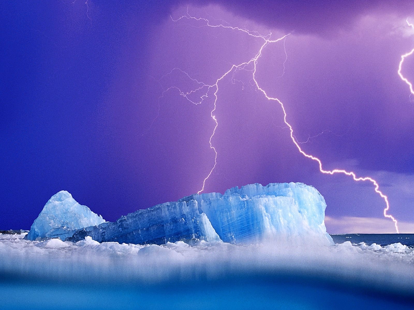 Artistic HD PC desktop wallpaper featuring vivid lightning striking over a serene icy landscape under a purple sky.