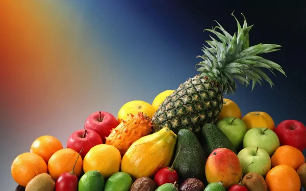 A vibrant 4K Ultra HD desktop wallpaper featuring a colorful assortment of fresh fruits including pineapple, apples, oranges, and avocados against a gradient background.