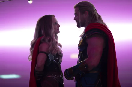 Jane Foster (Natalie Portman) and Thor (Chris Hemsworth) face each other in a dramatic 4K Ultra HD scene from the movie Thor: Love and Thunder.