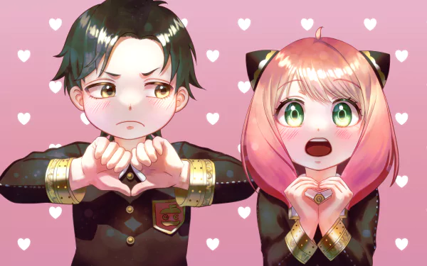 4K Ultra HD PC desktop wallpaper of Spy x Family anime: Anya Forger and Damian Desmond in school uniforms making hand-heart gestures against a pink, heart-patterned background.