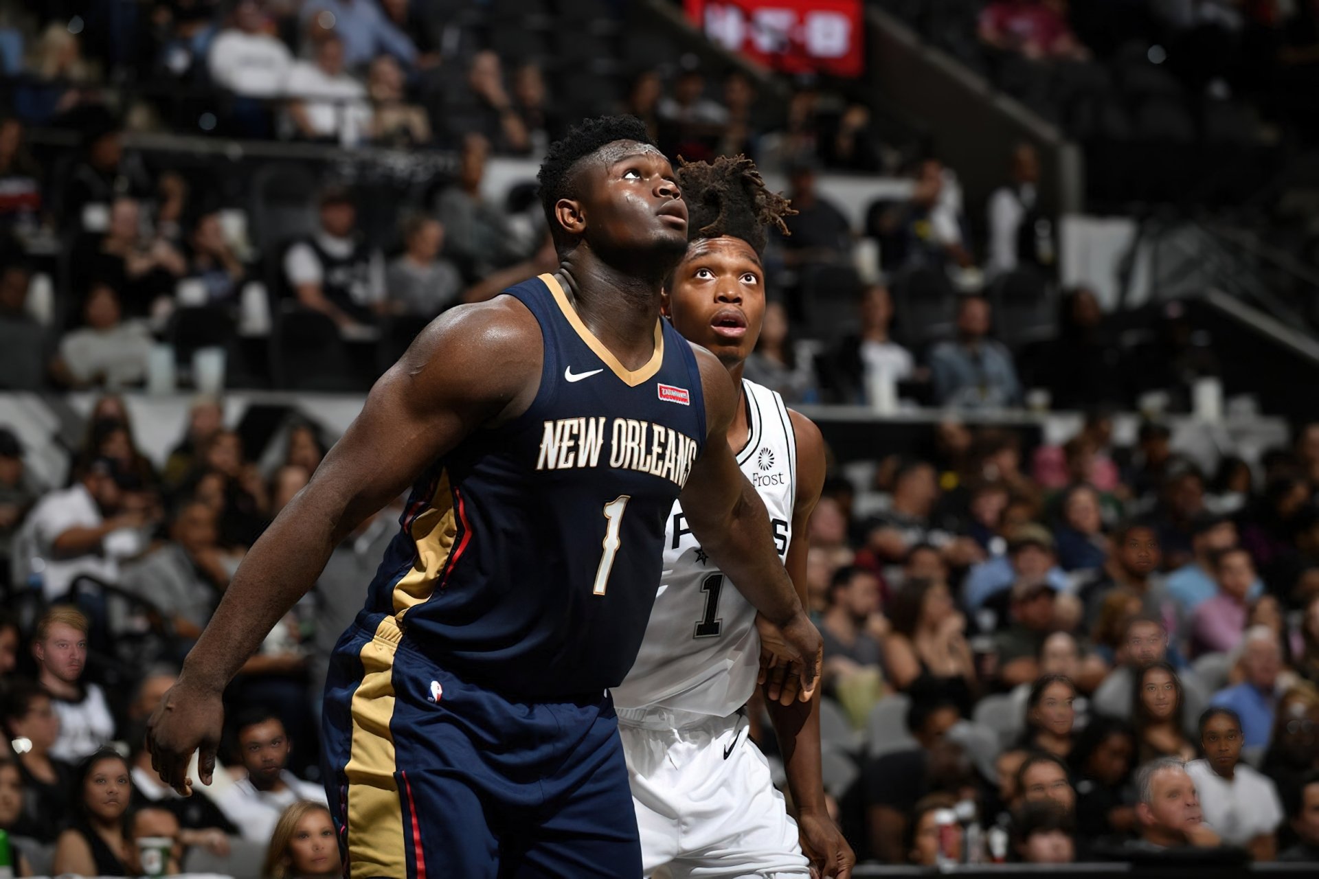 HD desktop wallpaper featuring Zion Williamson in action on the basketball court, wearing a New Orleans jersey.