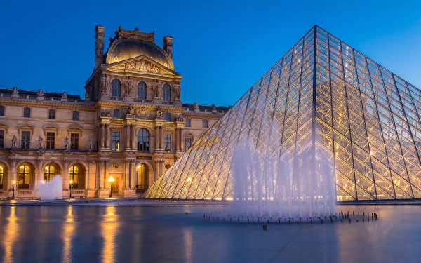 A stunning HD desktop wallpaper of the Louvre in Paris, France.