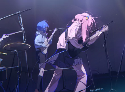 Hitori Gotou and a band member perform passionately on stage in this HD desktop wallpaper from the anime Bocchi the Rock!. Dynamic colors and energy capture the essence of their performance.
