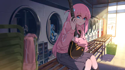 HD wallpaper of Hitori Gotou from Bocchi the Rock! anime, sitting in a laundromat with a guitar. The sun's rays illuminate the peaceful scene, creating a serene and artistic atmosphere.