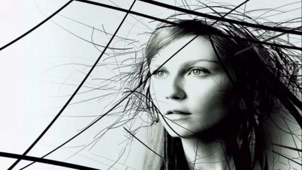 HD PC desktop wallpaper featuring a close-up black and white portrait of a woman with strands of hair, associated with the Spider-Man 2 movie.