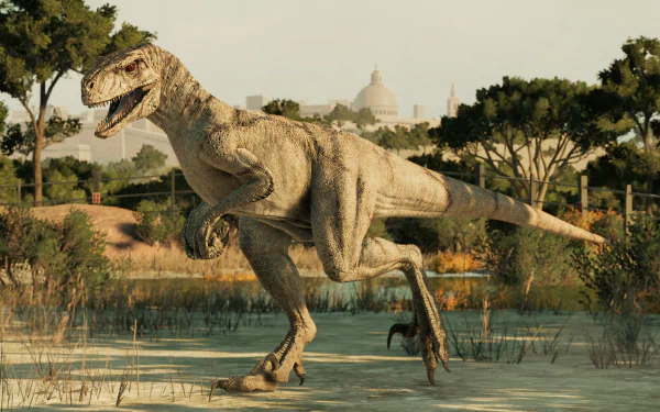 Jurassic World Evolution 2 HD PC desktop wallpaper and background: a raptor sprinting through a marsh with trees and a domed city skyline behind.