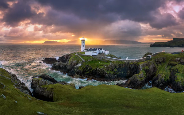 A stunning desktop wallpaper of a man-made lighthouse, exuding a sense of strength and guidance against a beautiful background.