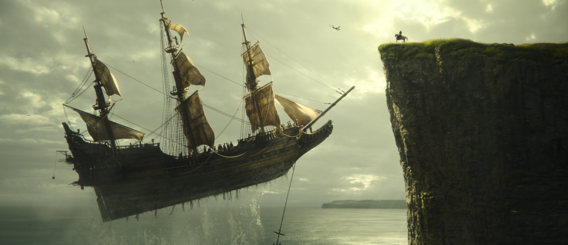 HD wallpaper featuring the iconic scene from Peter Pan with the pirate ship near a cliff and Wendy standing on the edge, representing a magical moment of the story.