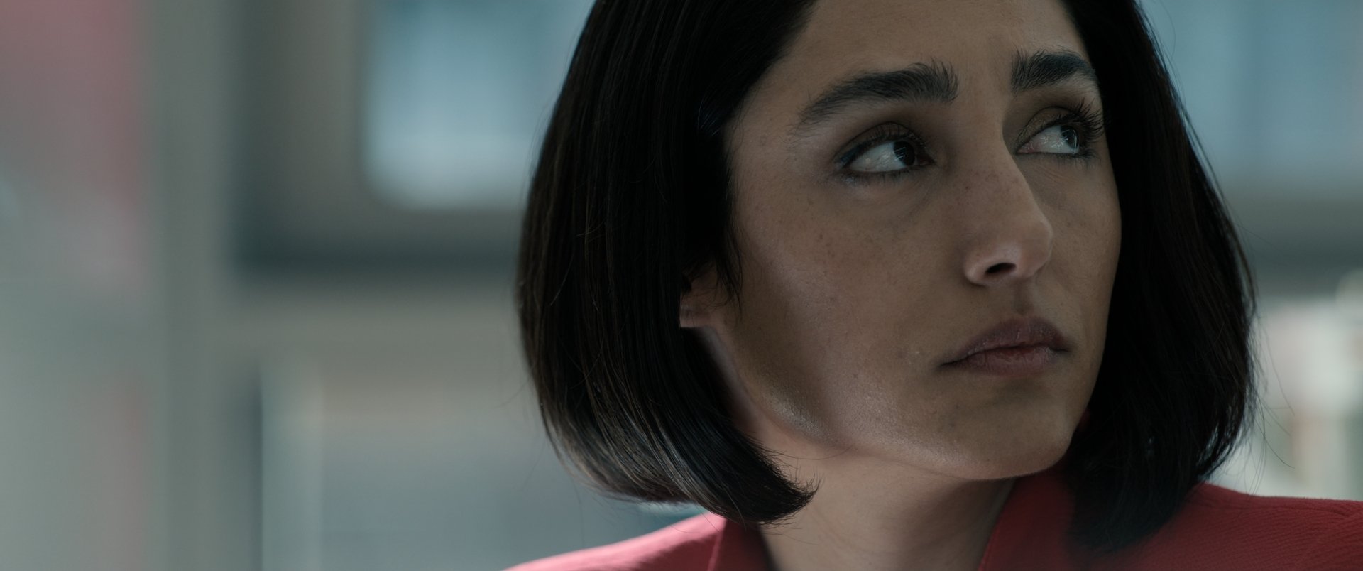 Golshifteh Farahani in a striking moment from the movie *Extraction 2*, featured as a high-definition desktop wallpaper and background, showcasing her captivating expression.