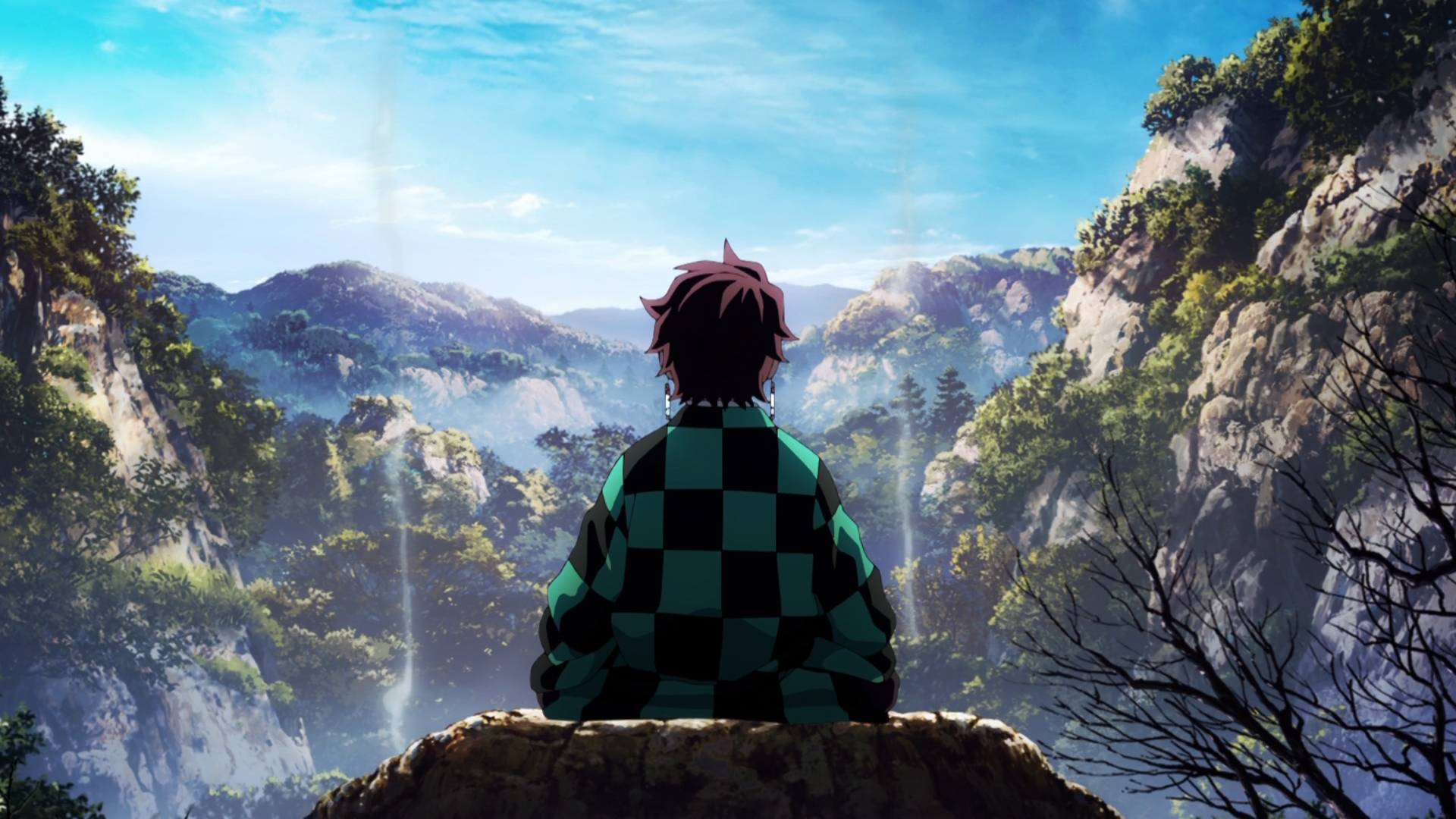 HD anime desktop wallpaper featuring Tanjiro Kamado from Demon Slayer: Kimetsu no Yaiba, seated and overlooking a scenic mountainous landscape with a bright blue sky.