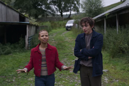HD Desktop wallpaper featuring two characters in an outdoor setting from the show Black Mirror with a rustic background.