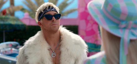 Ryan Gosling in character for the Barbie 2023 movie, wearing a fur coat and sunglasses, against a pink backdrop—HD desktop wallpaper and background.