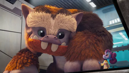 HD desktop wallpaper from Star Wars: Young Jedi Adventures featuring a cute, furry creature interacting with a small character in a colorful, playful setting.