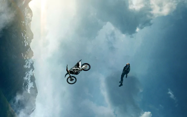4K Ultra HD desktop wallpaper from the movie Mission: Impossible - Dead Reckoning Part One, featuring a dramatic motorcycle jump beside a skydiver against a cloudy backdrop.