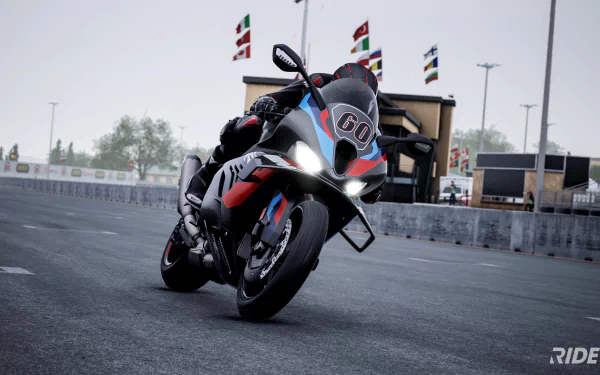 HD wallpaper of a sport motorcycle from Ride 5 video game on a racing track background.