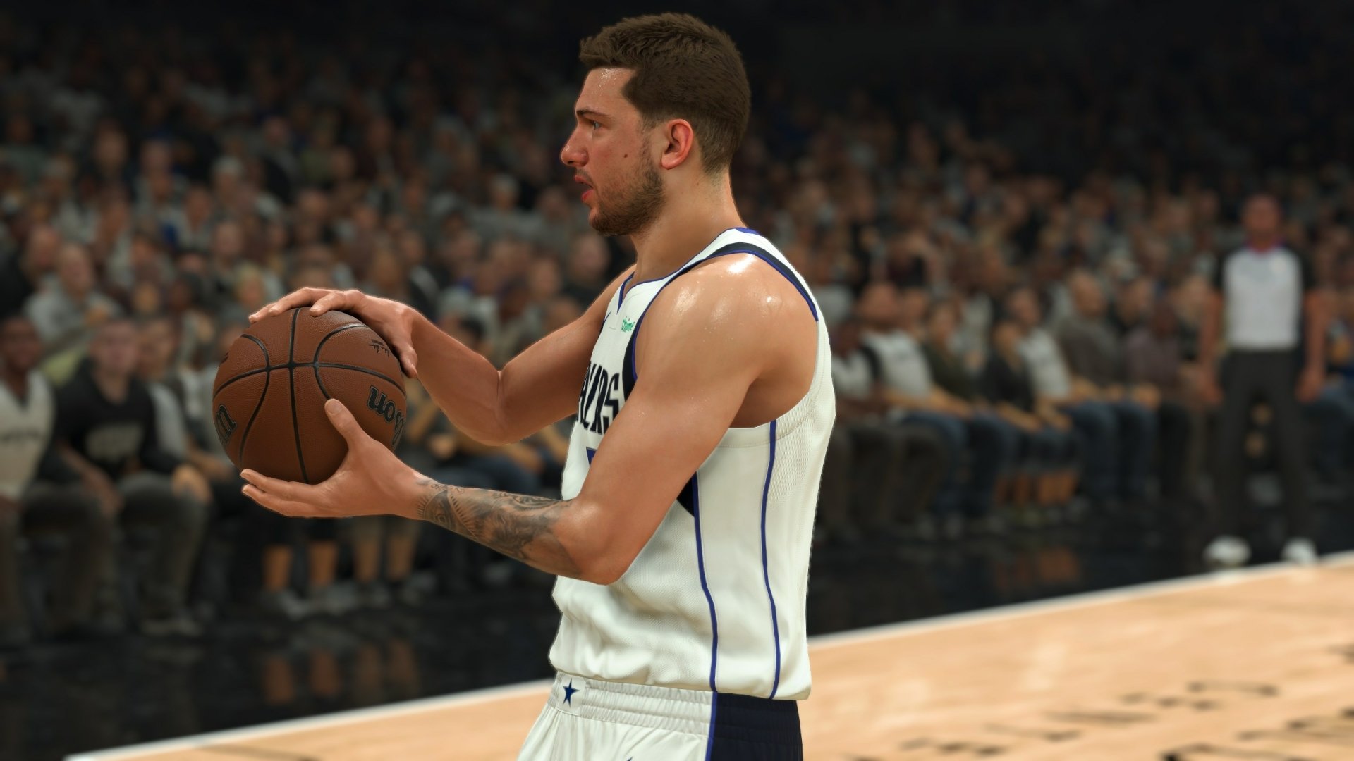 HD desktop wallpaper featuring a basketball player from NBA 2K24 video game with a focused expression, preparing for a free throw, set against a packed arena backdrop.