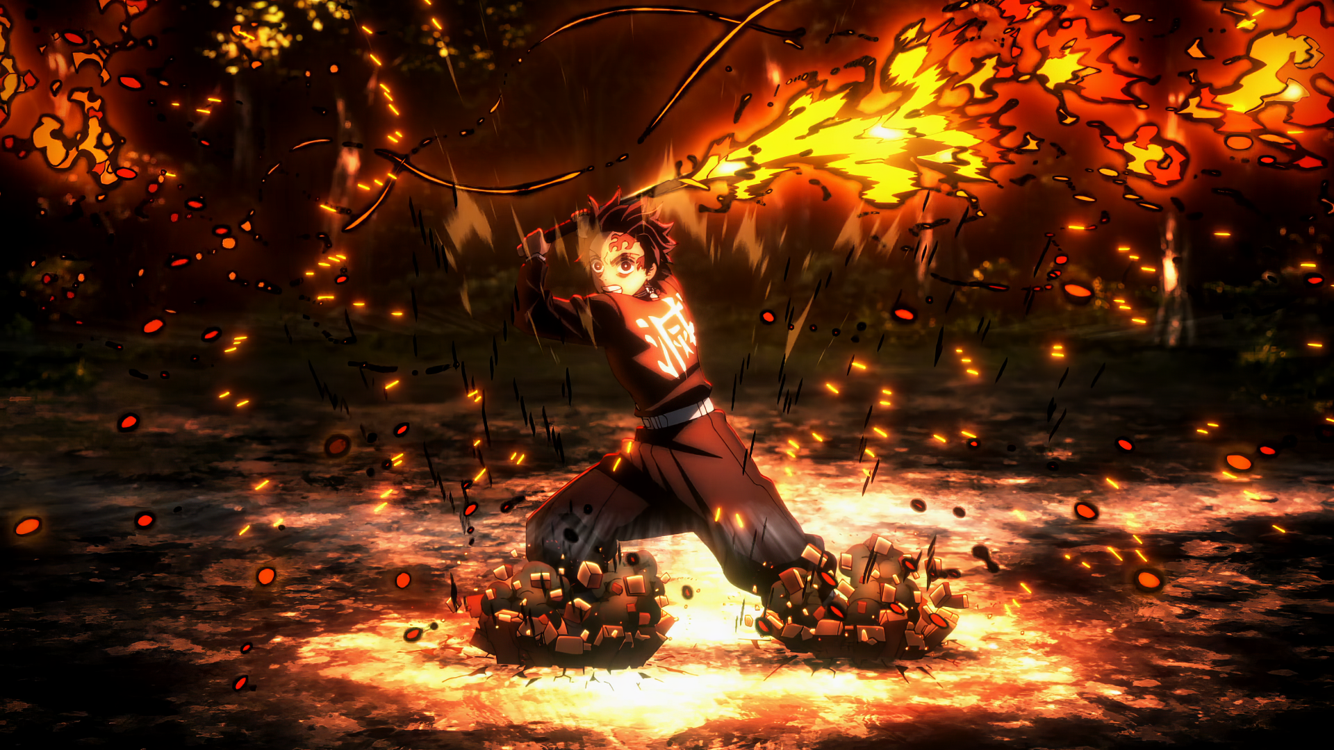 Tanjiro Kamado from Demon Slayer: Kimetsu no Yaiba unleashes a fiery attack in a dynamic 4K Ultra HD anime desktop wallpaper scene.
