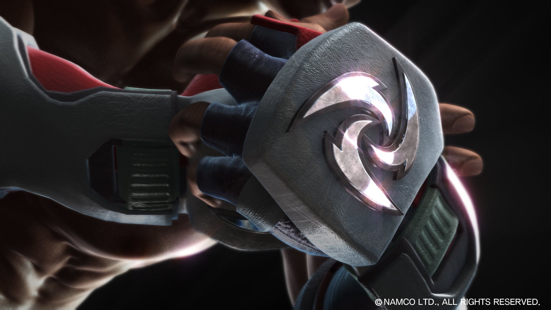 Tekken video game HD PC desktop wallpaper background: close-up of a gloved hand wearing a metallic brace with a glowing spiral emblem.