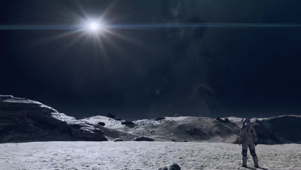 4K Ultra HD PC wallpaper of an astronaut on a rocky planet surface under bright stars, inspired by the space video game Starfield.