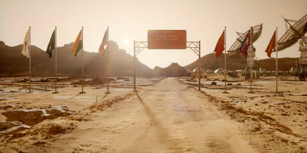 HD desktop wallpaper featuring 'For All Mankind' with an array of international flags and a Mars habitat under an orange sky.