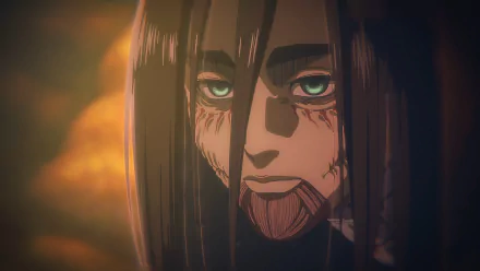 HD desktop wallpaper featuring Eren Yeager from Attack on Titan, depicted with intense green eyes and detailed facial markings against a fiery background.