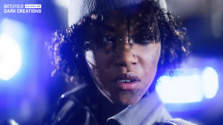 HD desktop wallpaper featuring a close-up of a female character from Battlefield 2042, with a focused expression and atmospheric blue lighting.