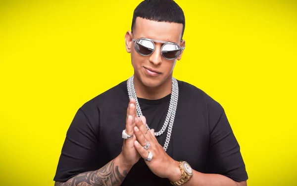 HD desktop wallpaper featuring a stylish man in sunglasses against a yellow background.