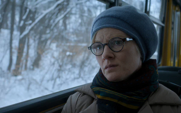 HD desktop wallpaper featuring a contemplative character from 'For All Mankind' seated in a vehicle with a snowy landscape in the background.