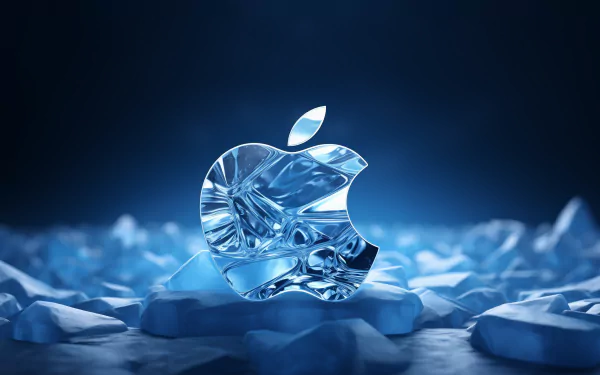 HD desktop wallpaper featuring a crystalline blue Apple logo on a textured icy background with a cool blue hue.