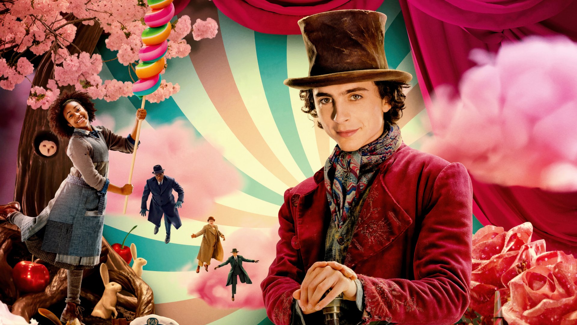 HD desktop wallpaper featuring a whimsical portrayal of Wonka with vibrant candy-themed background and a person with a top hat smiling at the forefront.