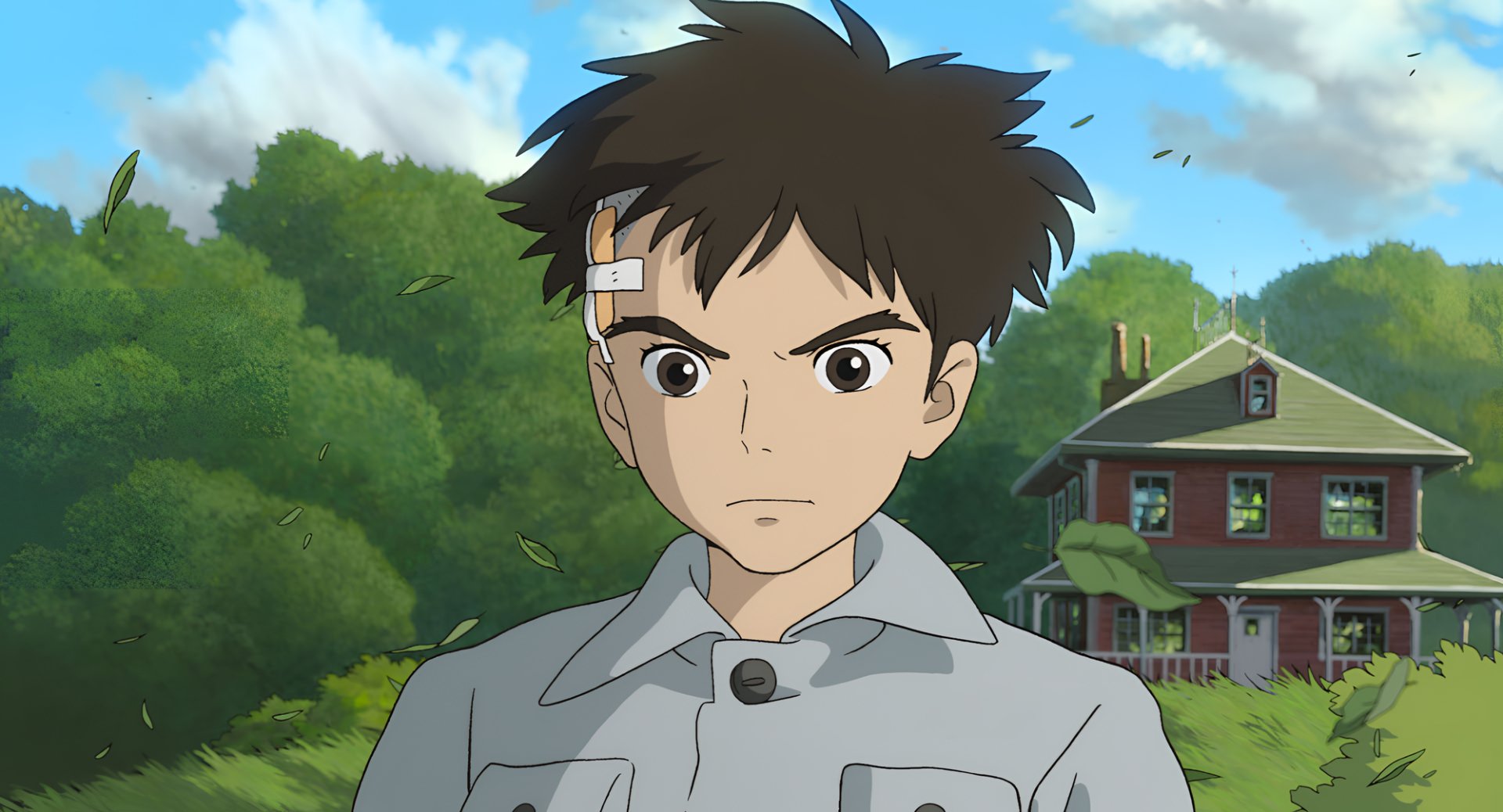 HD wallpaper of an animated boy from The Boy and the Heron with a countryside house backdrop.