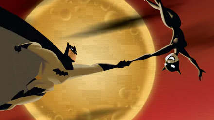 HD PC desktop wallpaper featuring stylized comic art of Batman and Catwoman silhouetted against a large, glowing full moon.