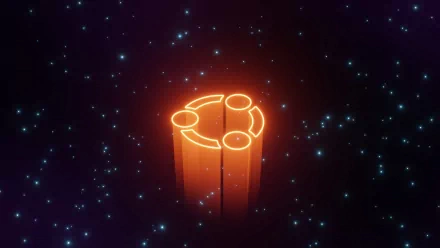 HD Ubuntu logo wallpaper with a glowing orange emblem on a starry dark background.