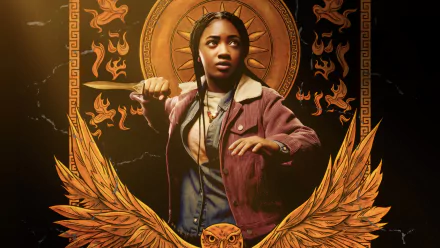 HD wallpaper featuring a character from the TV show Percy Jackson and the Olympians, poised with mythical symbols in the background.