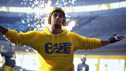 HD desktop wallpaper featuring a character from The Finals video game, with a vibrant yellow hoodie and a stadium background.
