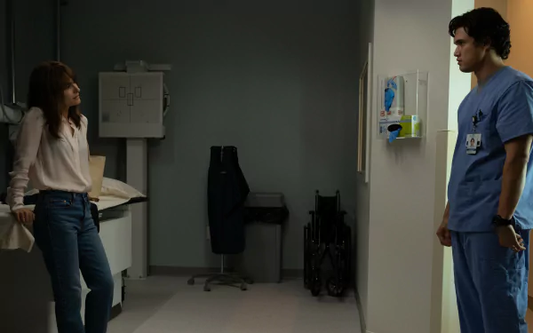 HD desktop wallpaper featuring two people in a medical setting, tagged with May December theme, suitable as a background.