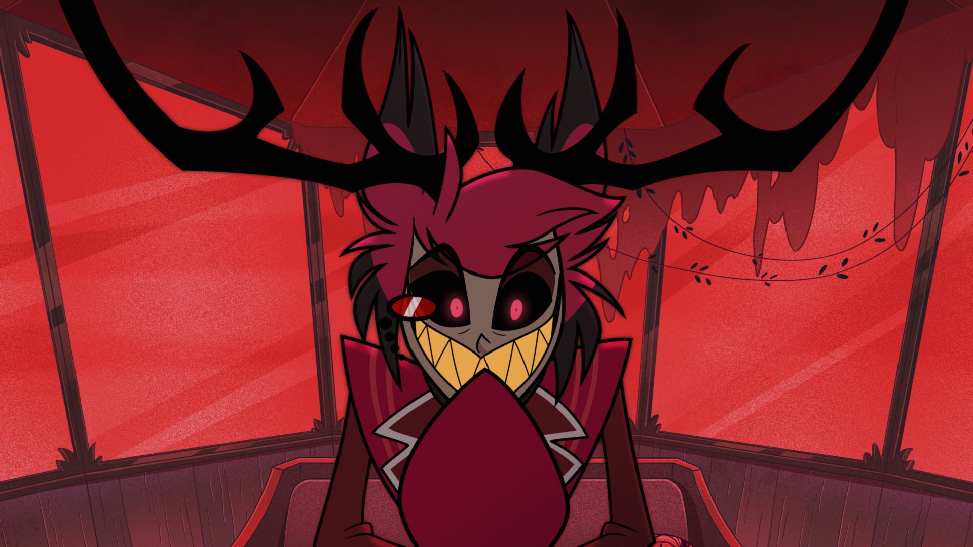 HD wallpaper of Alastor from Hazbin Hotel, showcasing the character's iconic smile and antlers against a red background for desktop use.