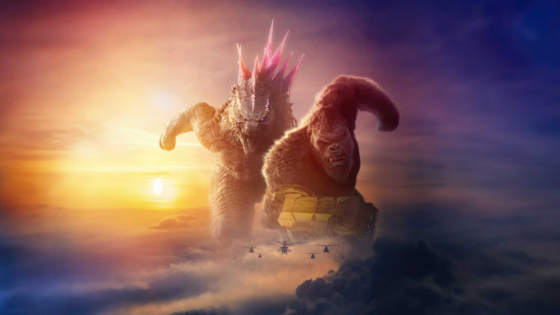 HD wallpaper of a scene from Godzilla x Kong: The New Empire featuring the iconic monsters Godzilla and King Kong roaring amidst a dramatic sunset and cloudscape.