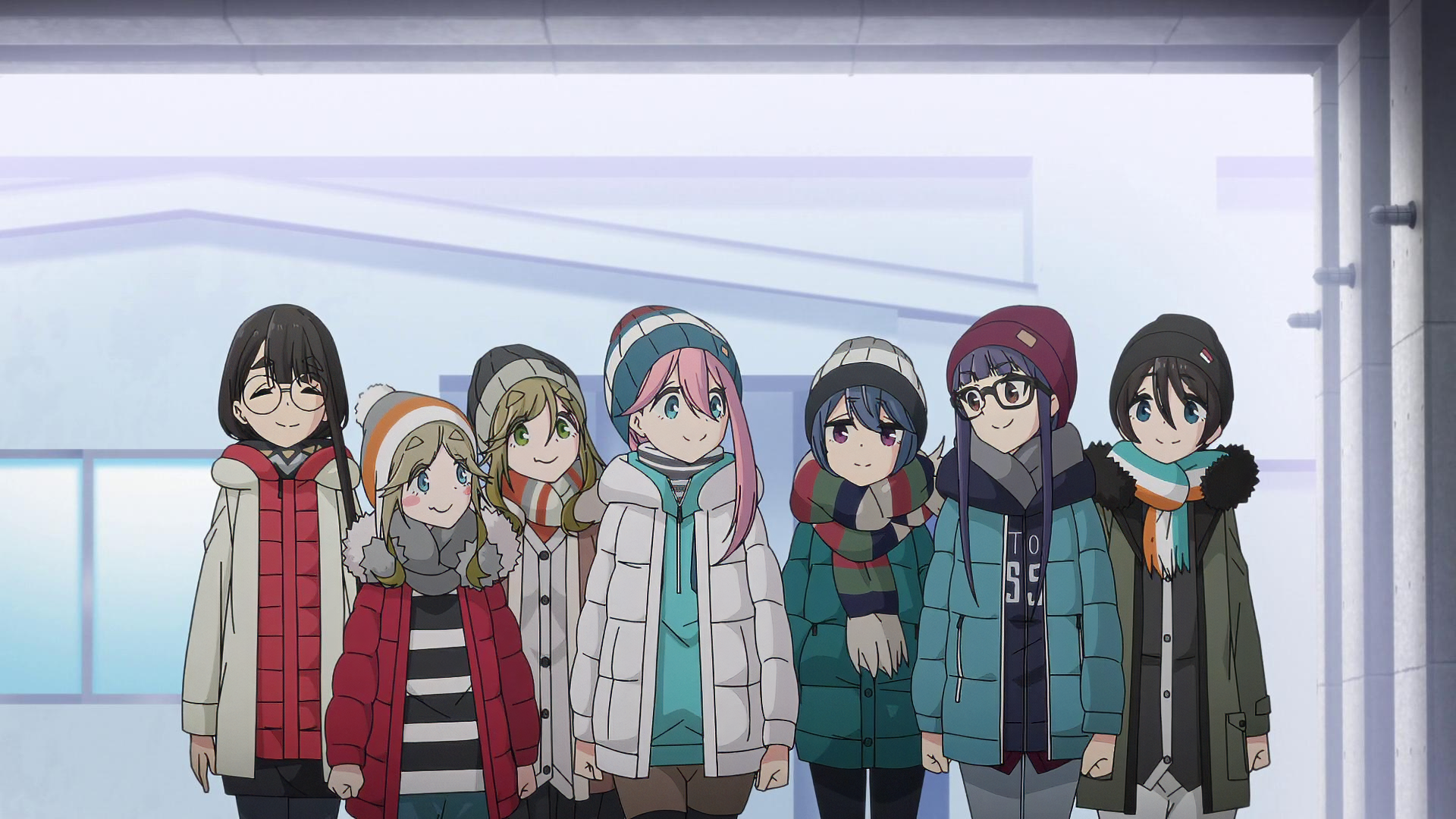 HD wallpaper of anime series Laid-Back Camp featuring the main characters bundled up in winter clothes, ready for an outdoor adventure.