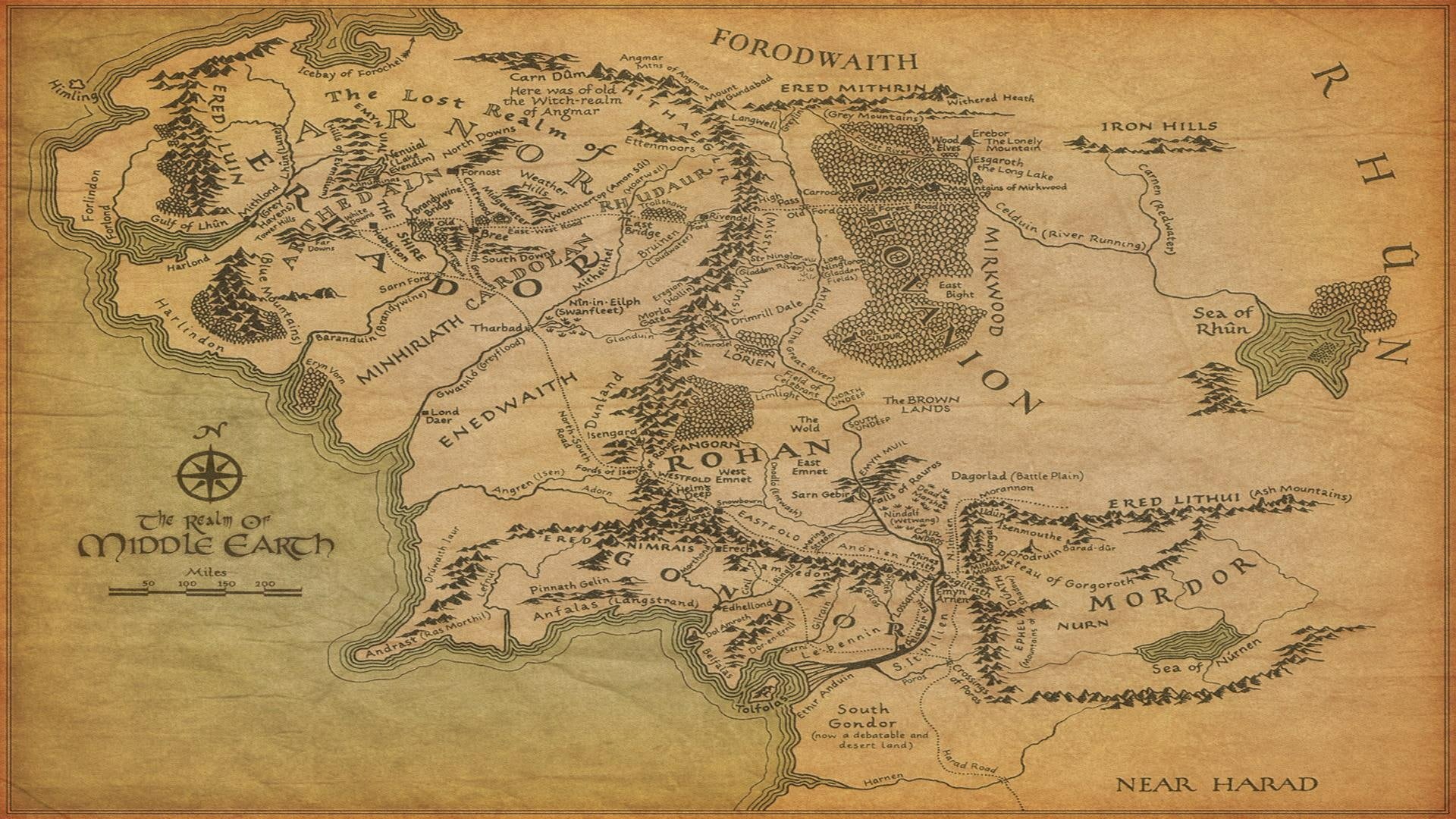 A detailed map of Middle Earth from The Lord of the Rings, featuring key locations like Rohan and Mordor, designed as an HD desktop wallpaper and background.