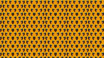 HD wallpaper featuring a vibrant orange background adorned with a repeating pattern of Tyler the Creator's face, celebrating his impact in music and rap culture.
