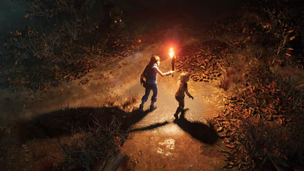 Two brothers explore a dimly lit path with a torch in the HD desktop wallpaper for the Brothers: A Tale of Two Sons video game remake.