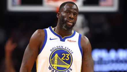 Golden State Warriors power forward in action on the court, representing an HD desktop wallpaper and background featuring the NBA team.