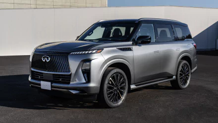 Silver Infiniti QX80 HD Wallpaper - Luxurious full-size SUV for desktop background.