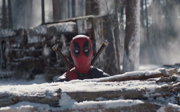 A dramatic HD wallpaper featuring Deadpool hiding behind a log in a snowy forest, embodying the thrilling atmosphere of the Deadpool and Wolverine movie.