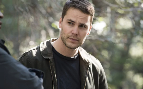 HD wallpaper of a character from the TV show True Detective, featuring actor Taylor Kitsch in a thoughtful pose.