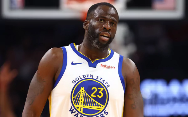 Golden State Warriors power forward in action on the court, representing an HD desktop wallpaper and background featuring the NBA team.