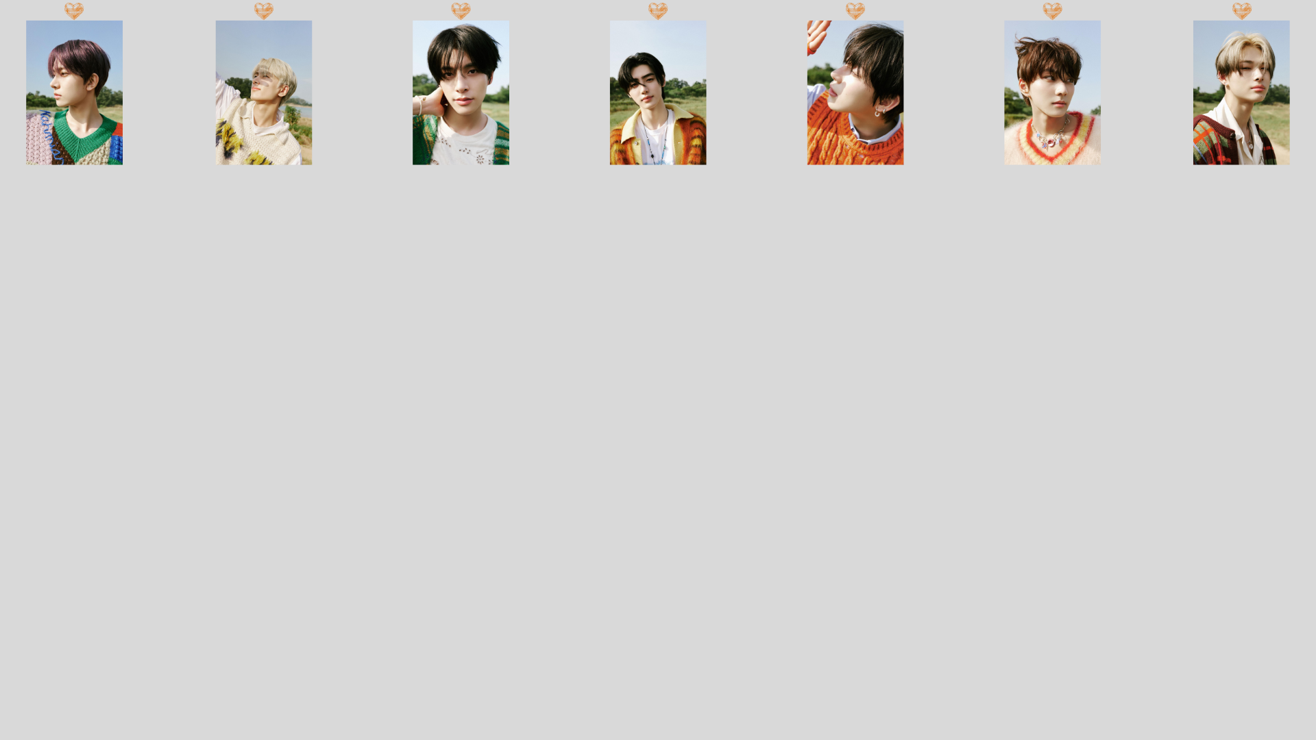 HD PC desktop wallpaper featuring individual portrait shots of ENHYPEN members arranged against a light blue background with small heart accents.