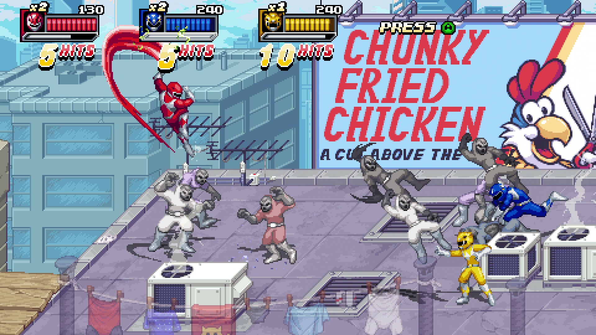 HD desktop wallpaper featuring gameplay from Mighty Morphin Power Rangers: Rita’s Rewind, with Power Rangers battling enemies on a rooftop, and a billboard for Chunky Fried Chicken in the background.