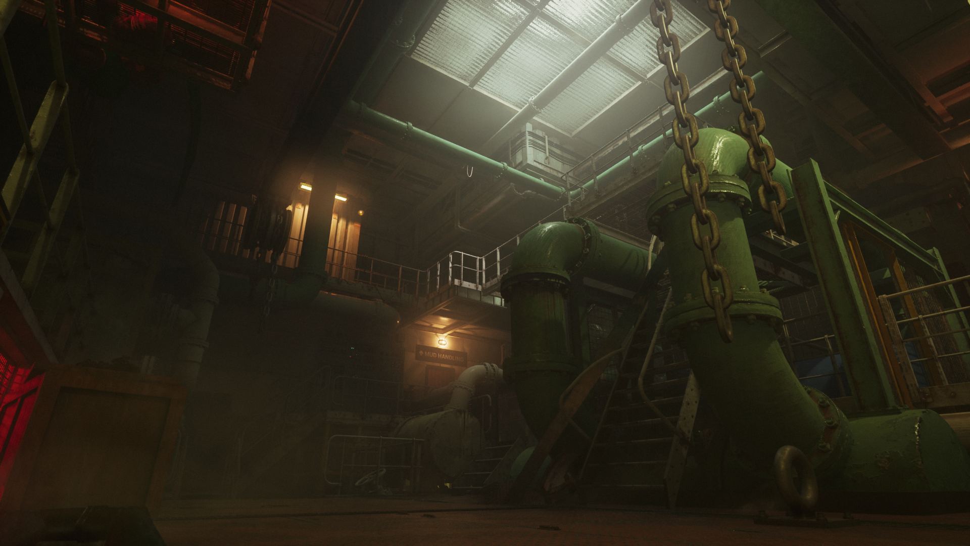 An HD desktop wallpaper of the video game Still Wakes the Deep, featuring a dimly lit industrial setting with large green pipes and heavy chains.
